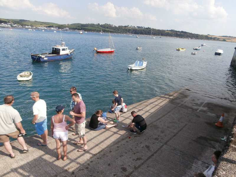 People waiting for the ferry and others are crabbing