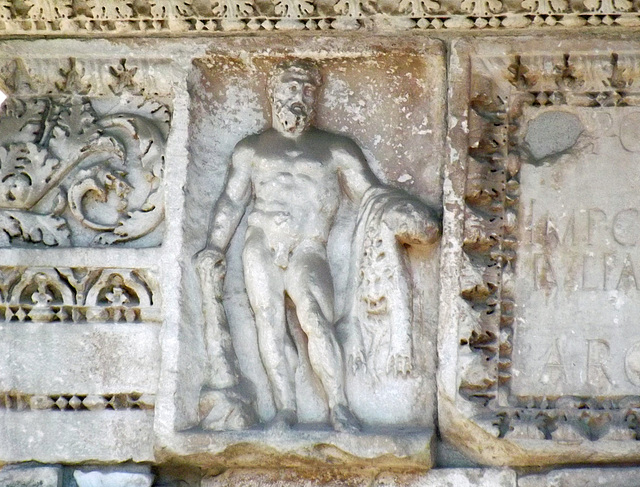 Detail of Hercules on The Arch of the Argentarii in Rome, July 2012