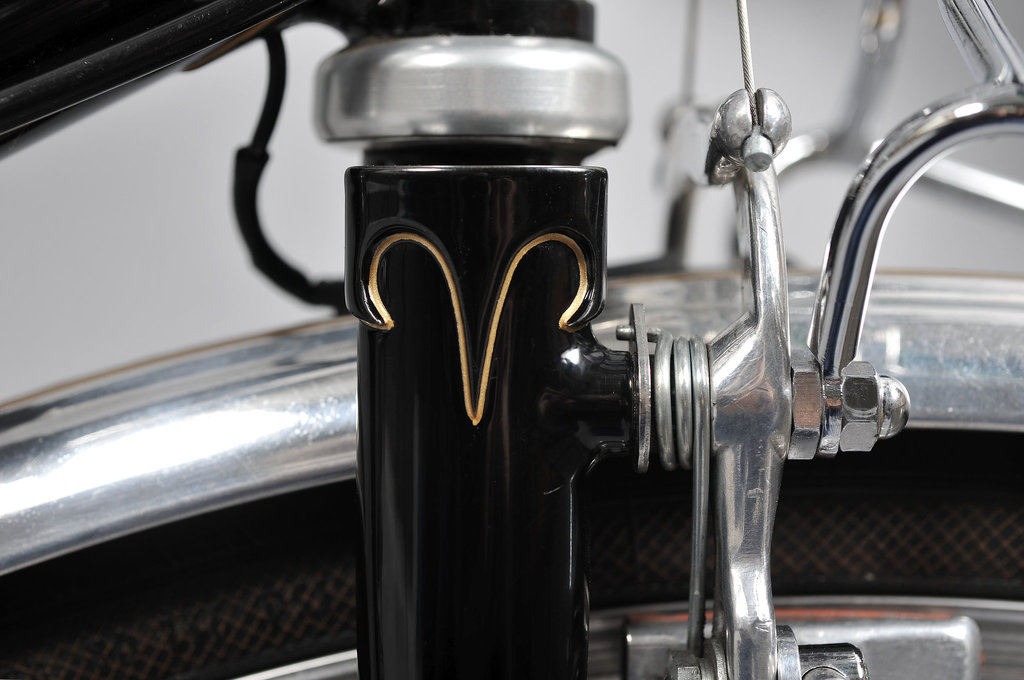 Reworked Vagner fork crown and braze-on center pull brake bosses. Note:  wire run to generator tail light below crown from inside of rack to inside of down tube