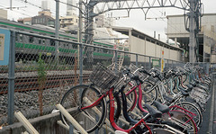 Bike parking lot by railway tracks