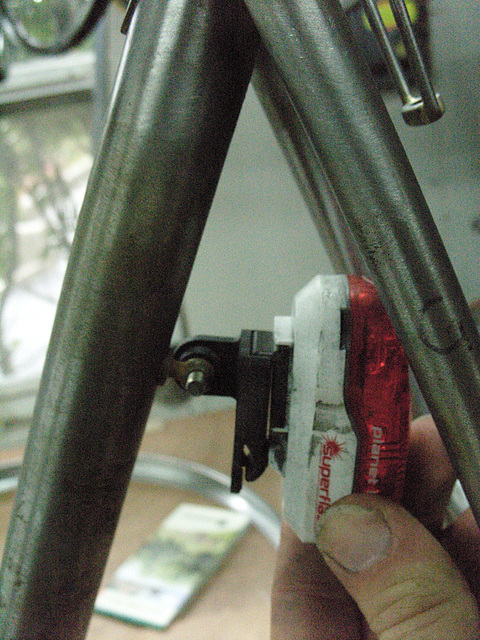 #CT209 Test fitting of supplemental tail light onto the braze on mount on the back of the seat tube (2009)