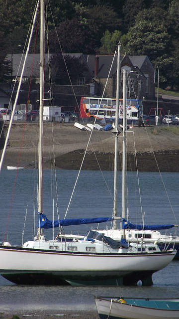 Another yacht standing in the sand