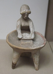 Terracotta Model of a Woman Grinding Wheat at a Basin in the British Museum, April 2013