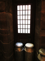 Milk churns, kitchen.