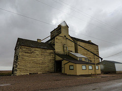 Skiff grain elevator. after the storm