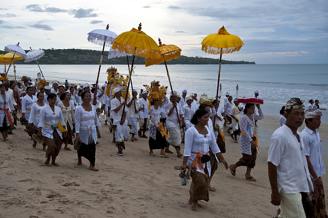 A ceremony on the beach held just before sunset