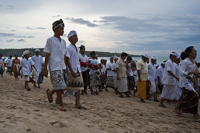 A ceremony on the beach held just before sunset