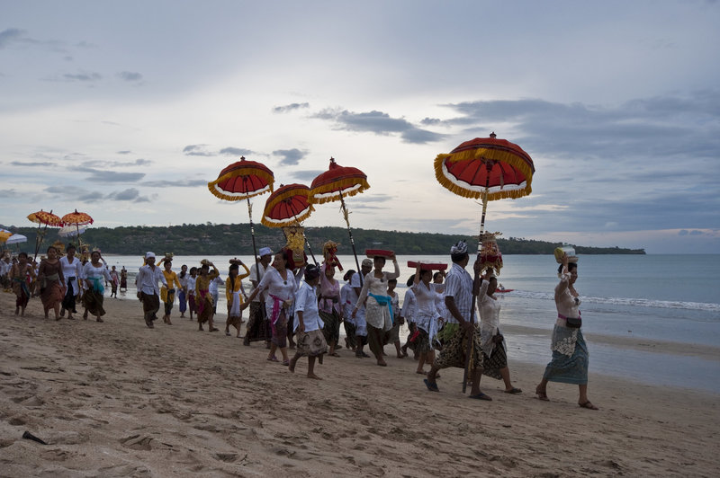 A ceremony on the beach held just before sunset