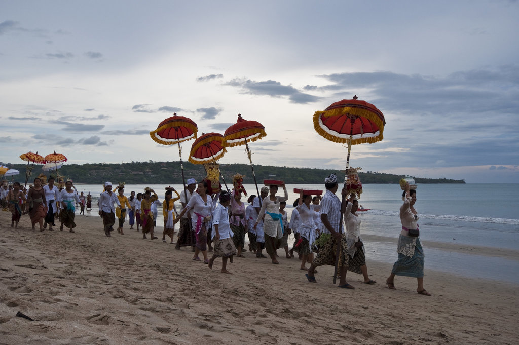 A ceremony on the beach held just before sunset