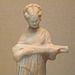 Detail of a Terracotta Figure of a Woman Playing a Type of Lute in the British Museum, April 2013