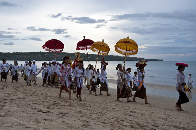 A ceremony on the beach held just before sunset