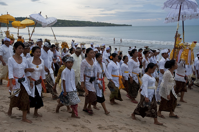 A ceremony on the beach held just before sunset