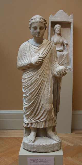 Limestone Statue of a Wreathed Boy Holding a Ball or Piece of Fruit in the Metropolitan Museum of Art, July 2010