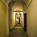 Evening lights in Oropa, Biella - Walking under the arcades of the cloister