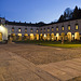 Evening lights in Oropa, Biella - The square of the Ancient Church and the fountain