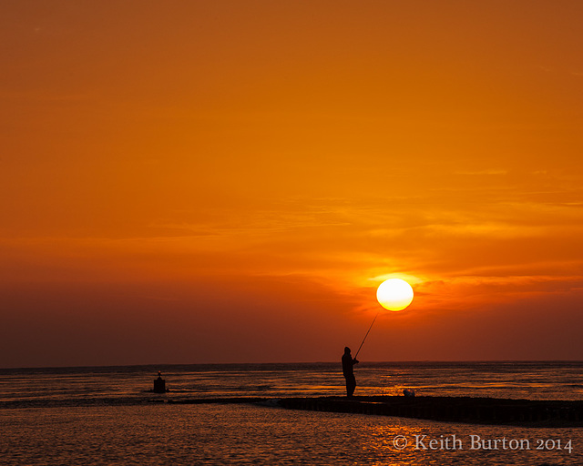 Fishing at sunrise