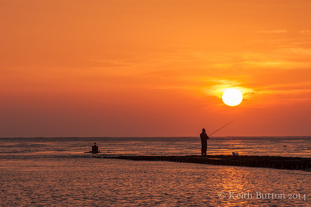 Fishing at sunrise