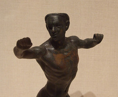 Detail of a Bronze Statuette of an Acrobat in the Metropolitan Museum of Art, October 2011