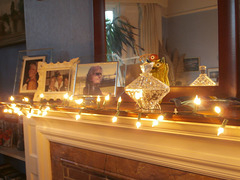 Fairy lights decorate my mantlepiece