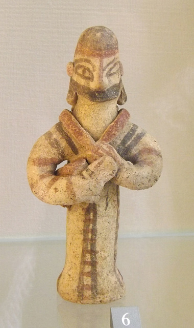 Statuette of a Man Holding a Child in his Arms and Another Child in his Hands in the Louvre, June 2013