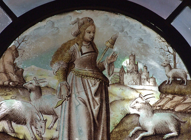 Detail of the Allegorical Figure: Goatherdess with Distaff and Spindle Stained Glass Roundel in the Cloisters, June 2011