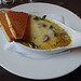 Fricassee of mushrooms with blue cheese and spinach served with toasted Brioche