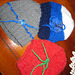 knitted cap with felt decorations