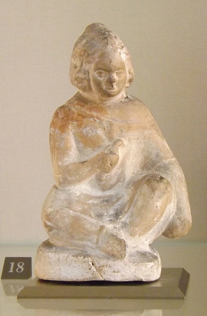 Seated Child Holding a Bird Terracotta Figurine in the Louvre, June 2013