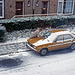 Clearing snow from a nice car ...