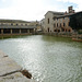 Italy, Bagno Vignoni Thermal Pool and the Church of San Giovanni Battista