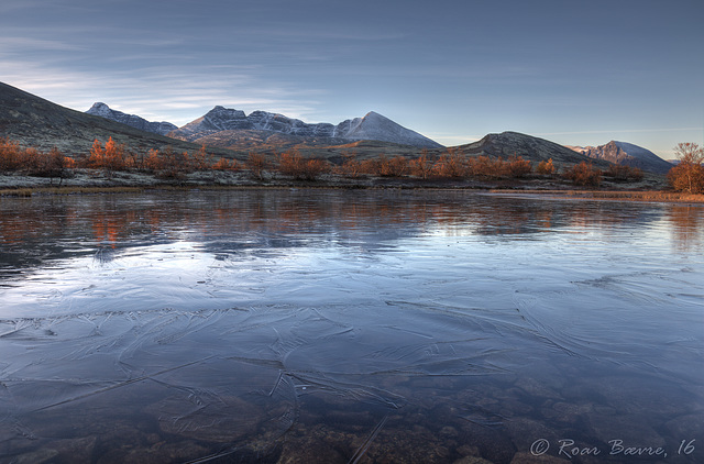 Icy lake in Døråldalen, Rondane mountains.