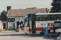 Excelsior Holidays 323 (A16 XEL) at the Smoke House Inn, Beck Row – 11 Jul 1994 (230-17A)