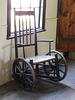 Wheelchair in Dr. Searing's Office in Old Bethpage Village, August 2022