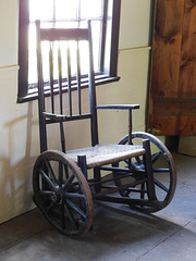 Wheelchair in Dr. Searing's Office in Old Bethpage Village, August 2022