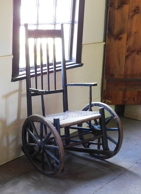 Wheelchair in Dr. Searing's Office in Old Bethpage Village, August 2022