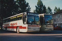 Excelsior Holidays 323 (A16 XEL) and Wallace Arnold J725 CWT at the Smoke House Inn, Beck Row – 11 Ju1 1994 (230-21A)