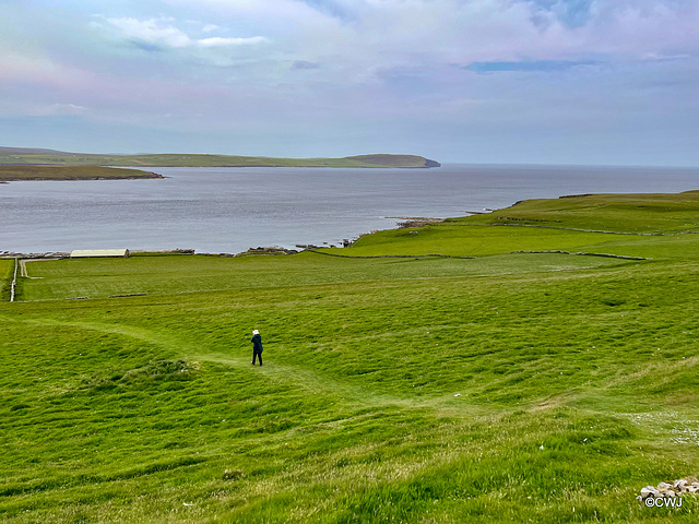 the steep path down to the Midhowe chambered cairn and the Broch