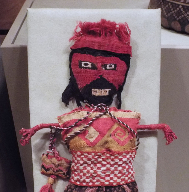 Detail of a Peruvian Figure Holding a Pouch in the Virginia Museum of Fine Arts, June 2018