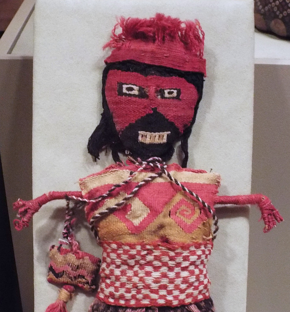 Detail of a Peruvian Figure Holding a Pouch in the Virginia Museum of Fine Arts, June 2018