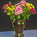 Colorful autumn bouquet in silver vase