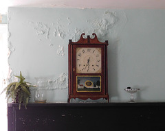 Clock and Damaged Wall in the Kirby House in Old Bethpage Village, August 2022