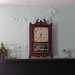 Clock and Damaged Wall in the Kirby House in Old Bethpage Village, August 2022