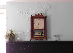 Clock and Damaged Wall in the Kirby House in Old Bethpage Village, August 2022