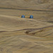 Farm Bins Among Hills