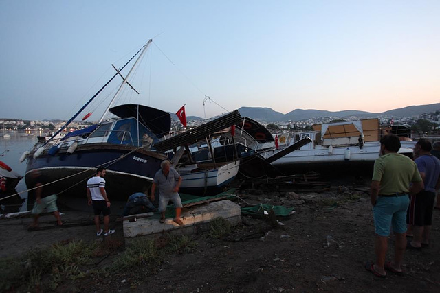 Boats are beached or keeling over