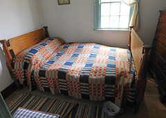 Bedroom in the Benjamin House in Old Bethpage Village, August 2022