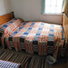 Bedroom in the Benjamin House in Old Bethpage Village, August 2022