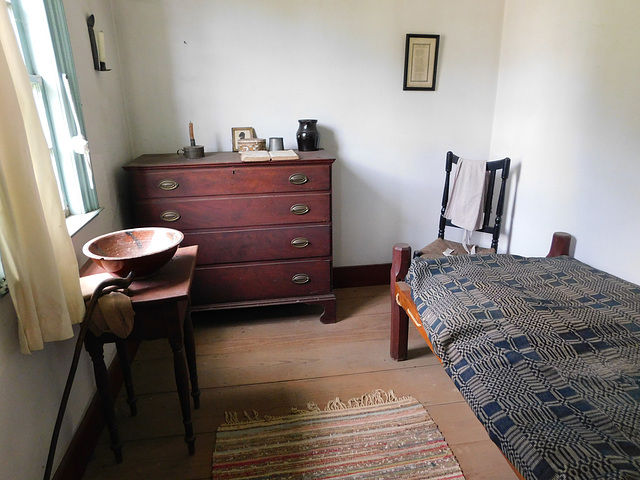 Bedroom in the Benjamin House in Old Bethpage Village, August 2022