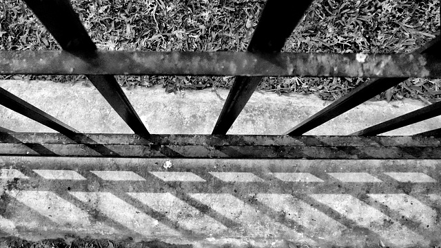 Fence and shadows, look down