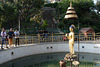 Kathmandu, Swayambhunath, Circular Pond with the Bronze Statue of Buddha (Statue of Peace)
